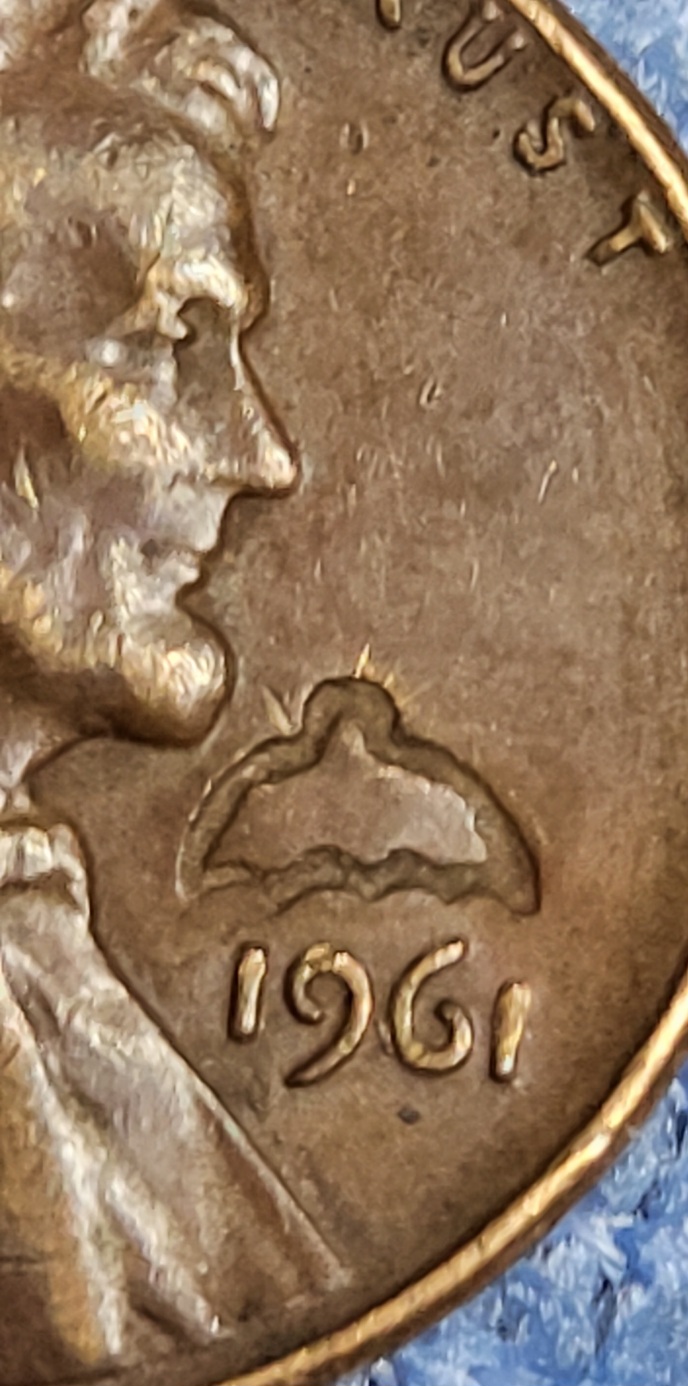 1961-Cent:-I've-Seen-A-Lot-Of-Pennies-With-Different-Emblems.-Counterstamps