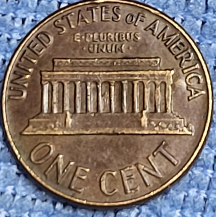 1961-Cent:-I've-Seen-A-Lot-Of-Pennies-With-Different-Emblems.-Counterstamps