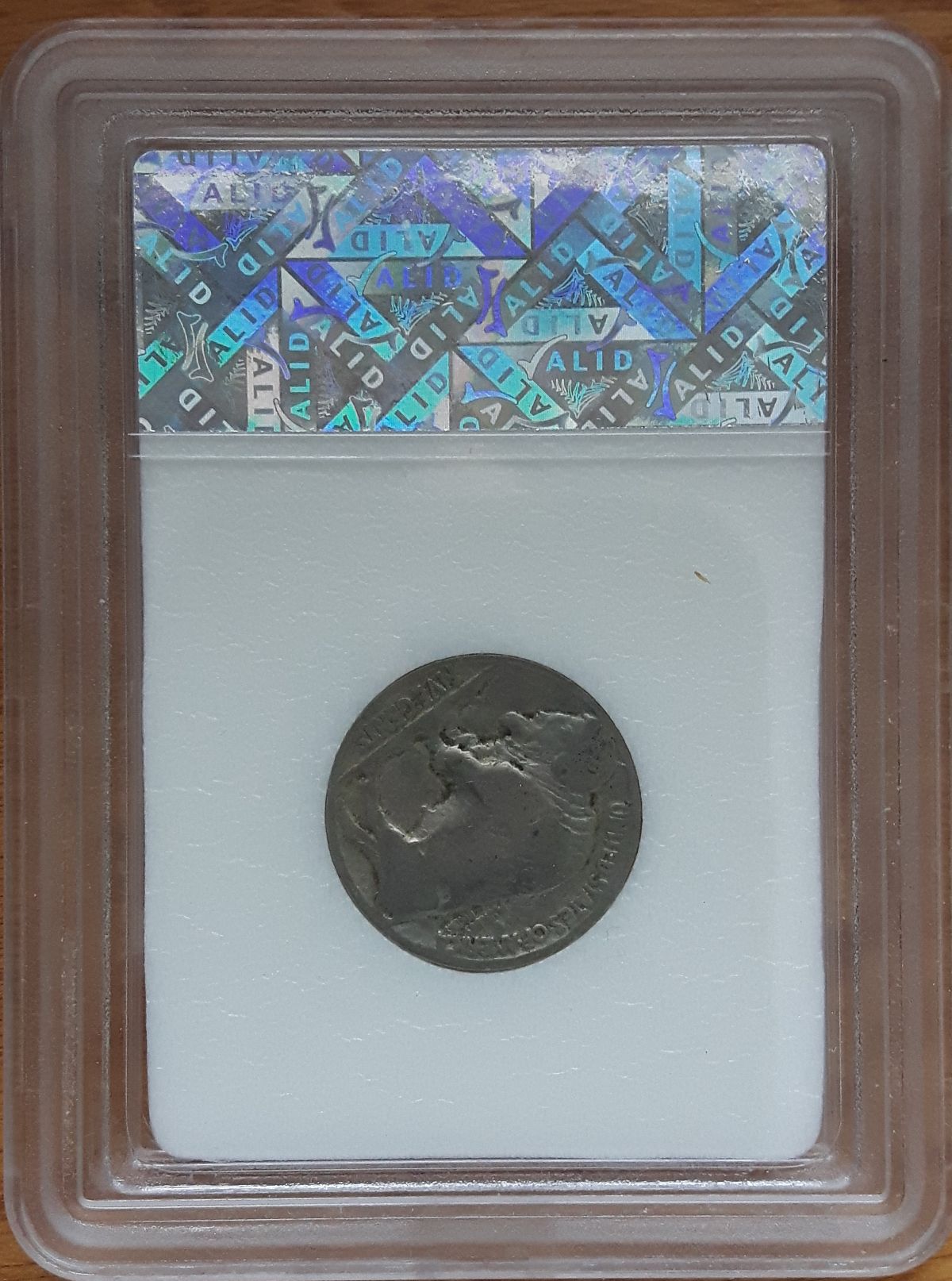Slabbing-Gone-Too-Far-An-Example-From-The-International-Numismatic-Bureau.