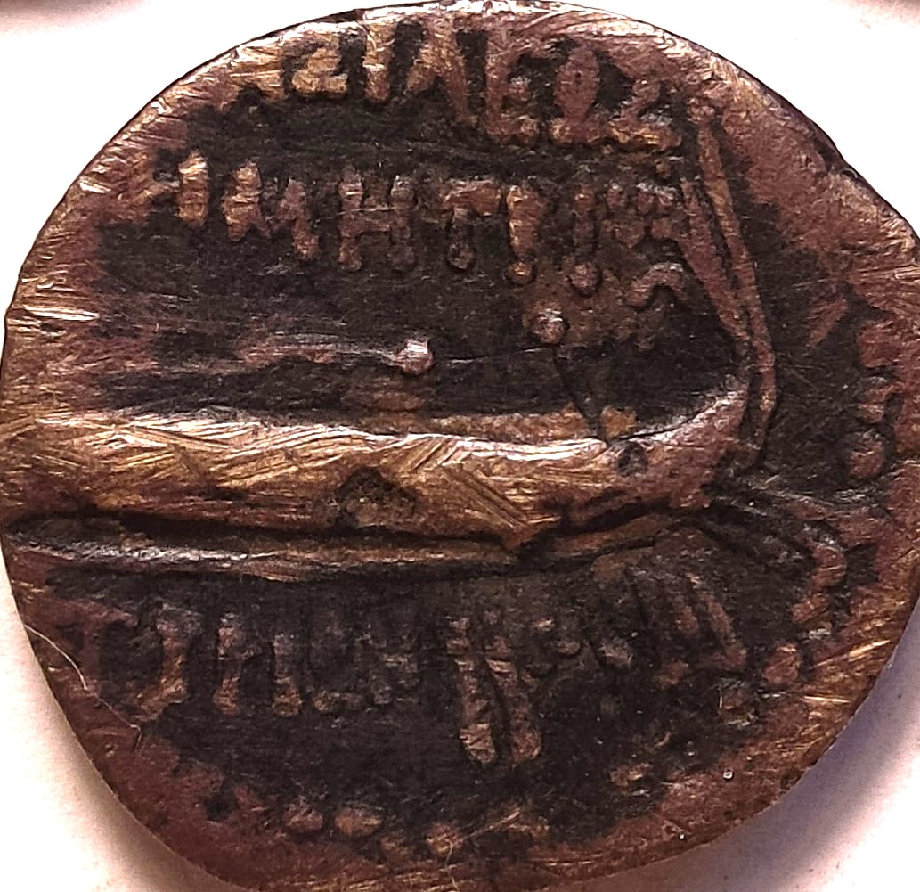 Last-Greek-Coin-With-A-Galley-Prow-And-Bust.-Some-Letters