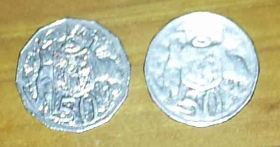 Found-A-Fake/Odd-PMD-1966-Round-50c-Today