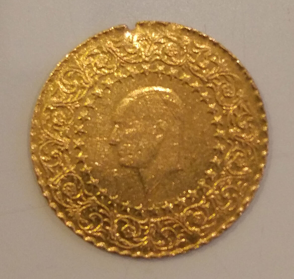 Need-Help-Identifying-Gold-Color-Coin/Medallion-From-1991
