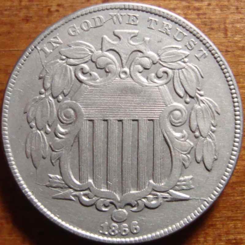 Shield-Nickel---Die-Pair-On-The-Way-To-The-Trash