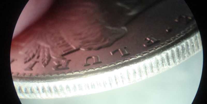 Strange-Mint-Error-On-1902-O-Morgan