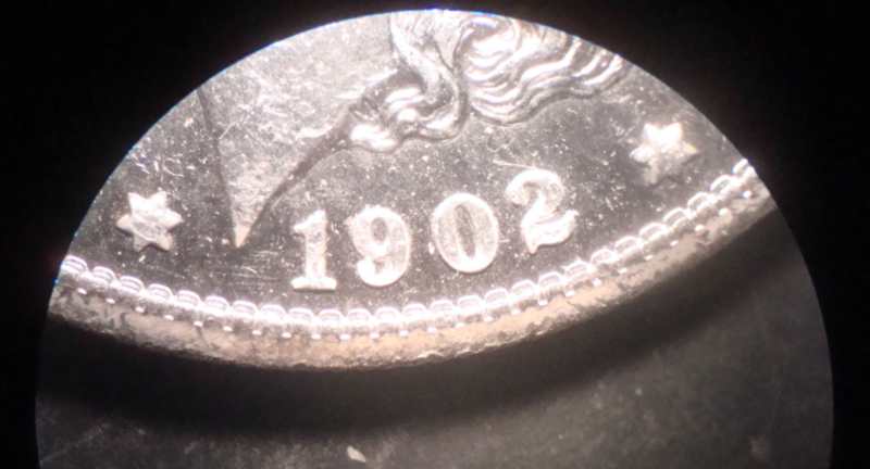 Strange-Mint-Error-On-1902-O-Morgan