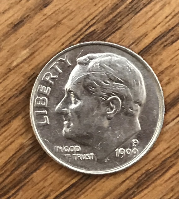 Help-1999-P-Dime-With-Long-Looking-Error-In-Forehead?