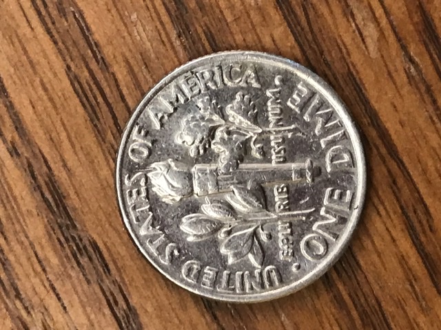 Help-1999-P-Dime-With-Long-Looking-Error-In-Forehead?