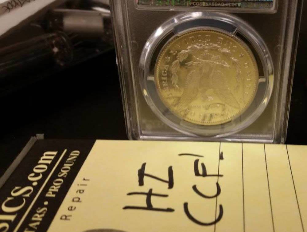 Old-1878-Morgan-$1,-Kinda-Shiny,-In-Plastic-Holder,-Grade?