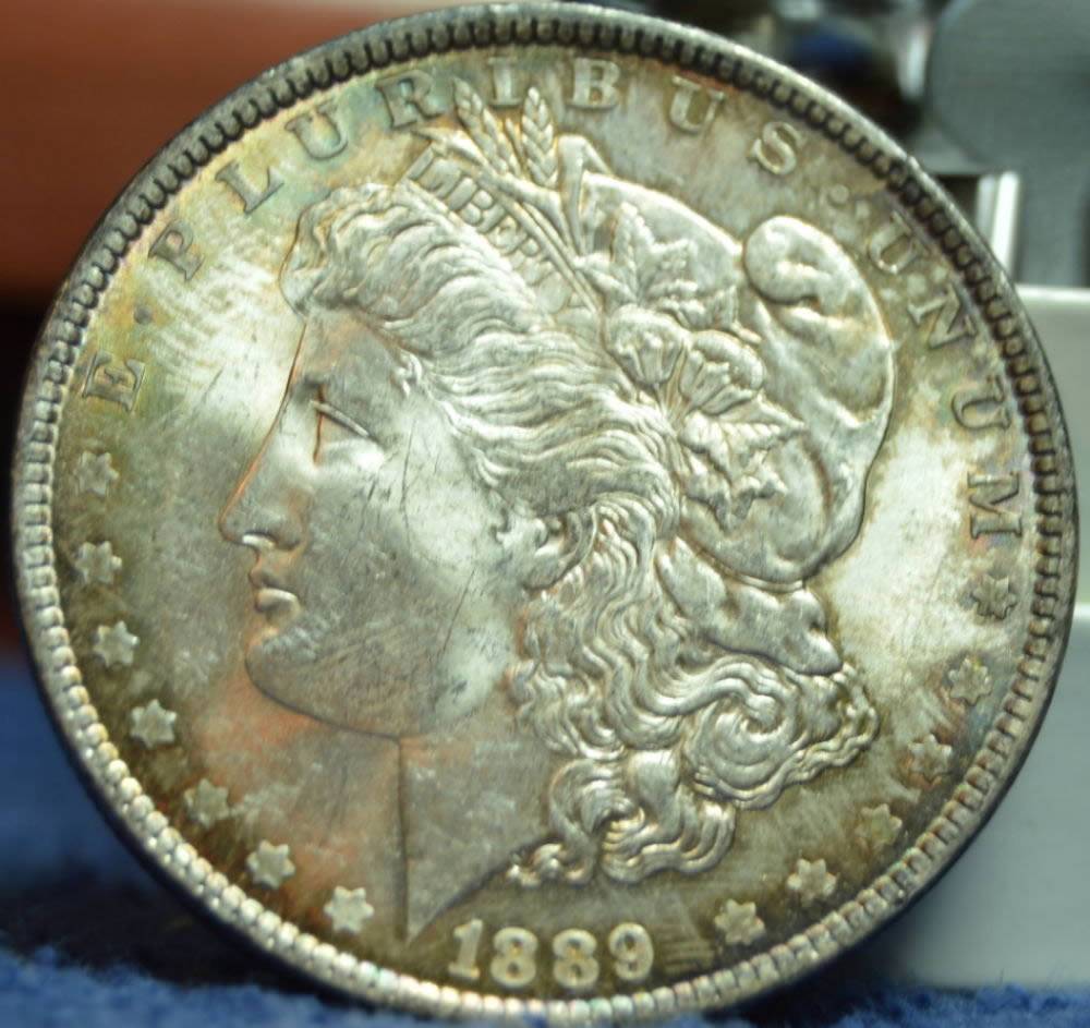 1899-Morgan-Dollar---Textile-Toning-Or-...?-Grade-It.-Raw