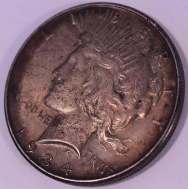 Bizarro-Toned-1934-Peace-Dollar-For-Grading