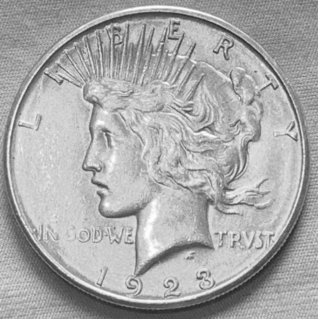 Morgan-1884-S--And-Peace-1923-Grading