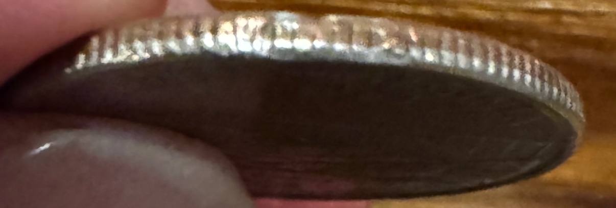 2005-P-Quarter-Clipped-Planchet-Or-PMD?