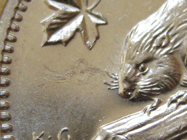 1964-Nickel-Some-Extra-Metal-And-Strike-Through?
