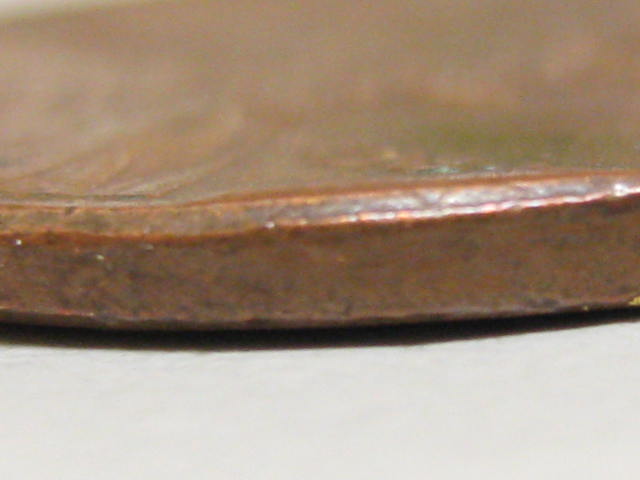1984-Folded-Rim-And-2004-Wierd-Spot-In-Date