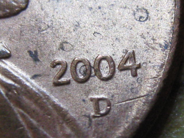 1984-Folded-Rim-And-2004-Wierd-Spot-In-Date