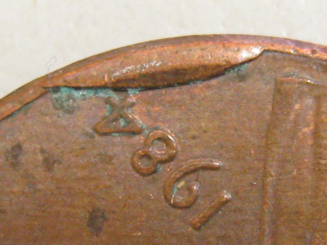 1984-Folded-Rim-And-2004-Wierd-Spot-In-Date