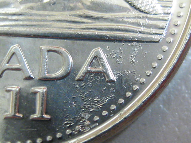 2-More-2011-Nickels-With-Plating-Issues