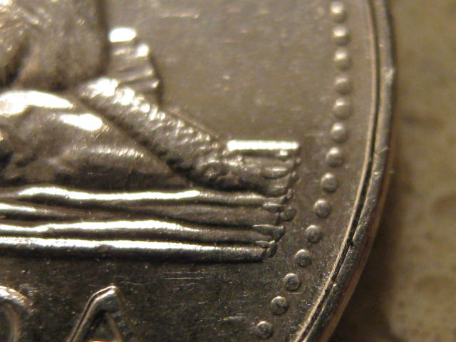 Couple-2001-Nickels-Bare-Belly