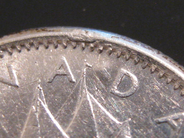1963-Dime-With-Blisters