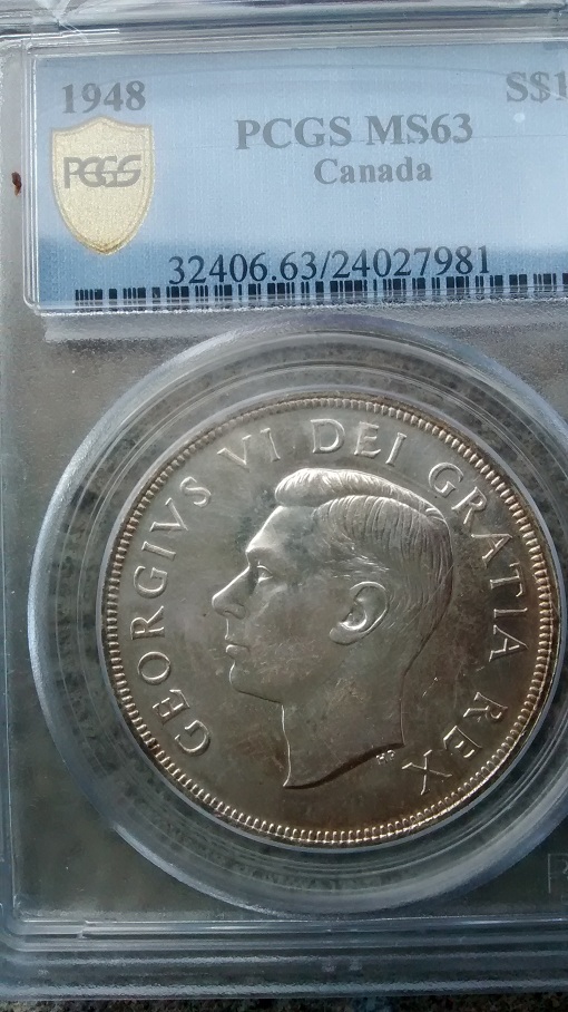 1948-Dollar-You-Vs.-PCGS