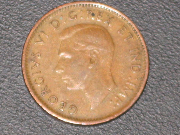 Several-Pennies-To-Grade-From-Coin-Roll-Hunting
