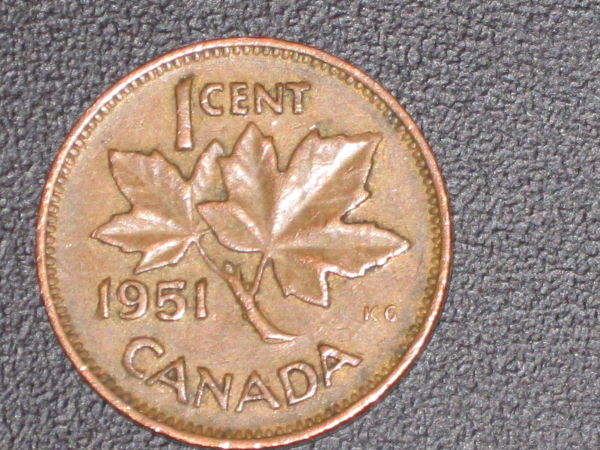 Several-Pennies-To-Grade-From-Coin-Roll-Hunting