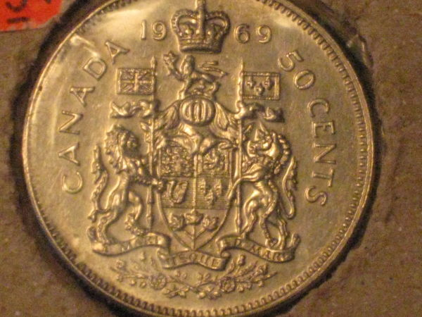 Five-Unc/Pl-50-Cent-Pieces,-Confused-About-Grades