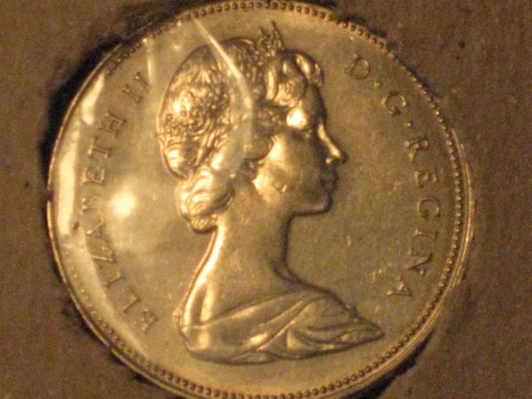 Five-Unc/Pl-50-Cent-Pieces,-Confused-About-Grades