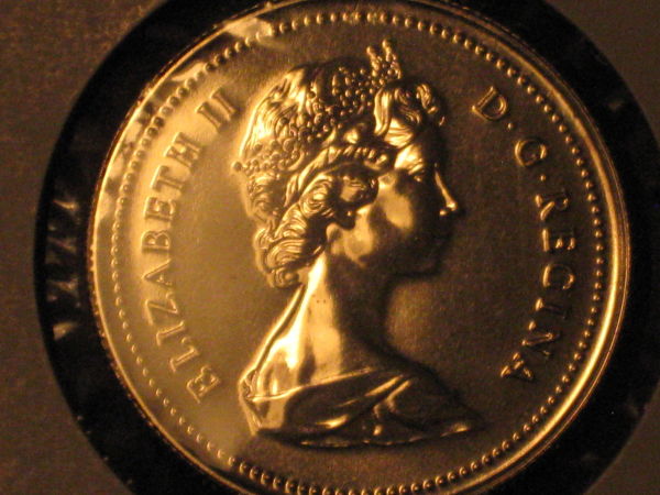 Five-Unc/Pl-50-Cent-Pieces,-Confused-About-Grades