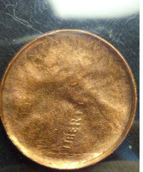 No-Date-Copper-LMC--Struck-Through-Late-Stage-Die-Cap-With-Rotation?