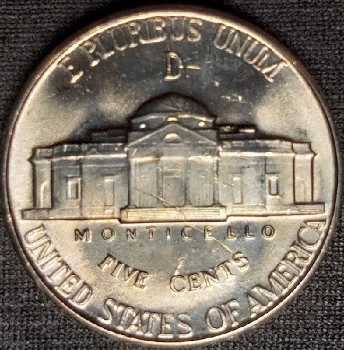1943-D-5c-MS-Jefferson-Nickel-With-A-Long-9-MM-Strike-Thru-On-The-Rev.-