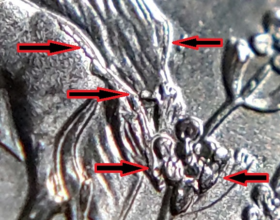 A-Couple-Of-Horses-Behinds.-2006-Nevada-Quarter--Die-Chips-On-Incuse-&-Raised-Devices.