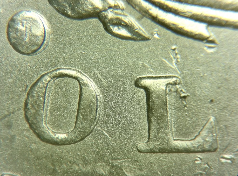 1884-O/O-With-O-Filled-In-Showing-Horizontal-Die-Lines.-VAM?
