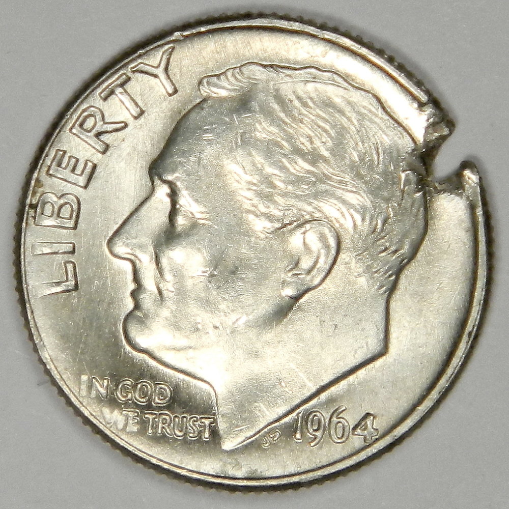 Silver-Roosevelt-Torn/Ripped-Planchet---What-Is-This-Error-Called?