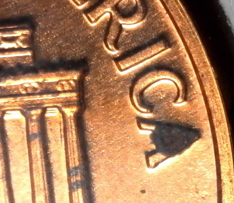 Black-Spot-On-Proof-Coin-Lmc