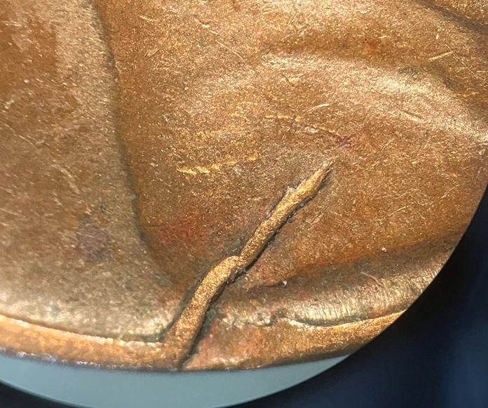 1947-D-Cent:-Pre-Cud?---Retained-Lamination?
