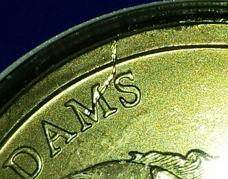 2007-John-Adams-With-Die-Crack