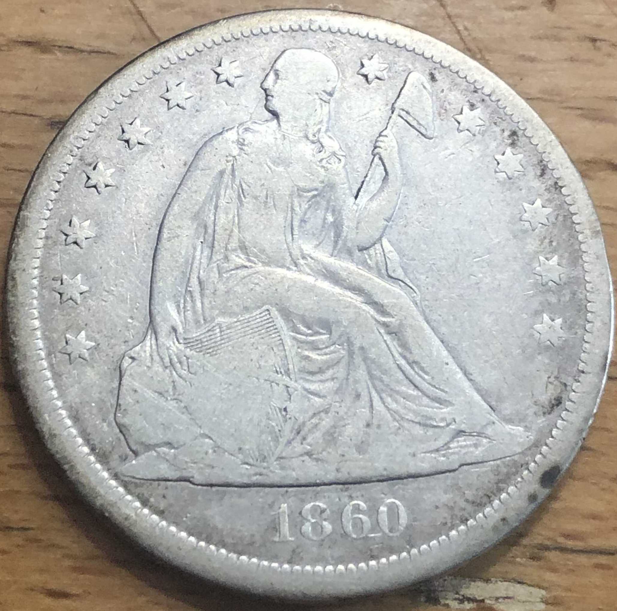 1860-O-Seated-Liberty-Dollar