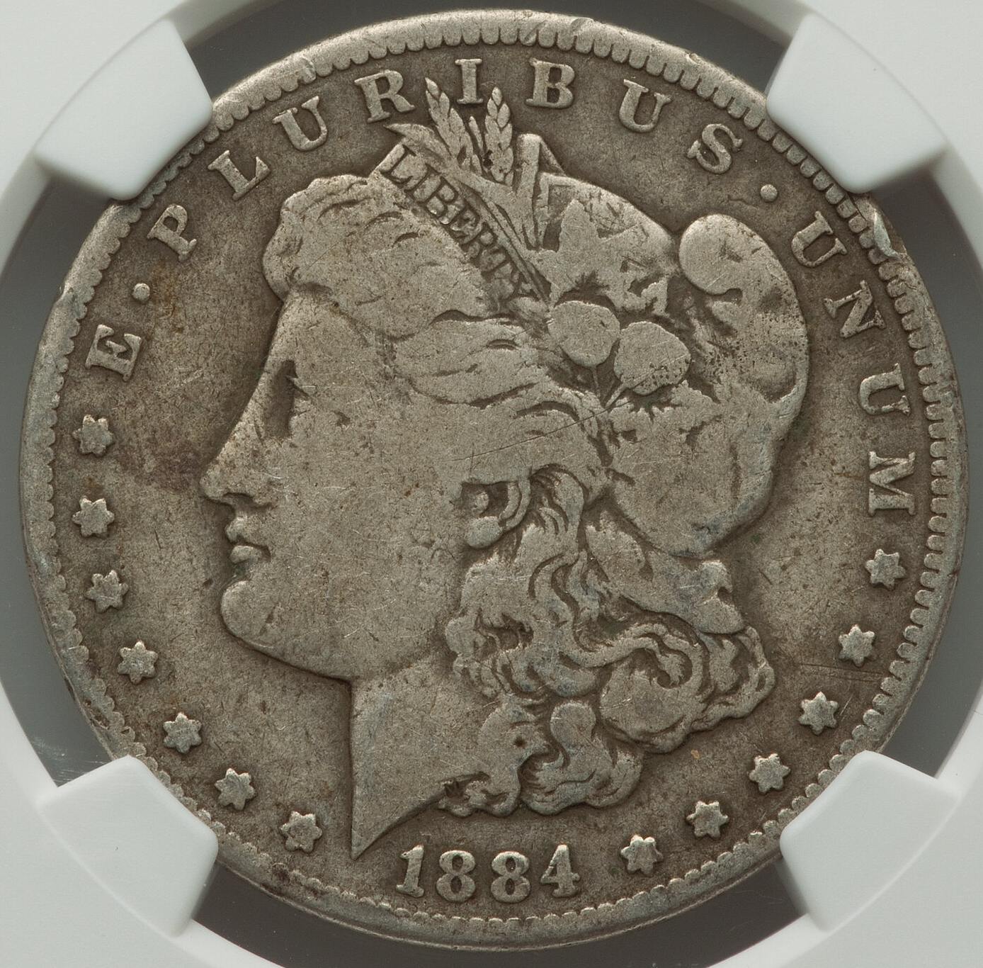 1884-CC-Morgan-Dollar-NGC:-She's-Got-Some-Mileage
