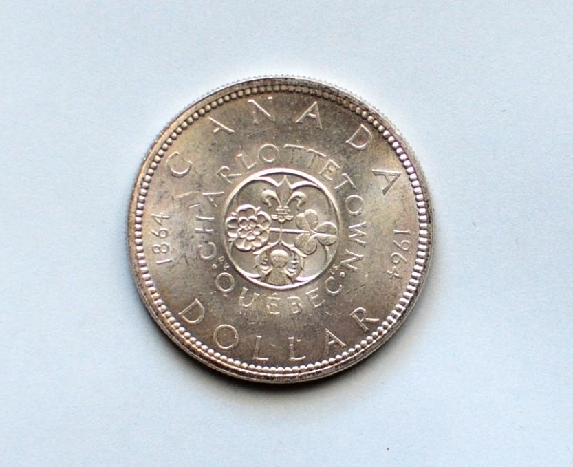 Would-Someone-Try-Grading-A-'58-And-'64-Silver-Dollar?