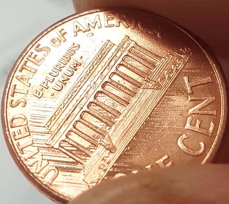 1998-Penny.-Small-Cud-On-REV-And-Several-Marks-Across-Under-Mem-And-Letters