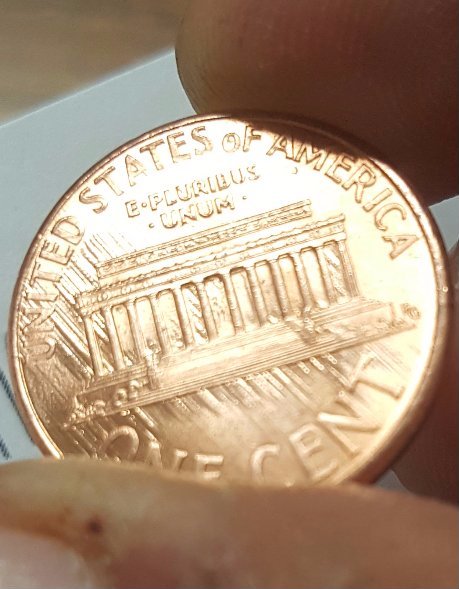1998-Penny.-Small-Cud-On-REV-And-Several-Marks-Across-Under-Mem-And-Letters
