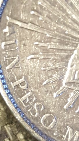 1899-Mexico-Un-Peso.-Die-Cracks-All-Over-OBV-&-Rev.-NE-Significance/-Worth?