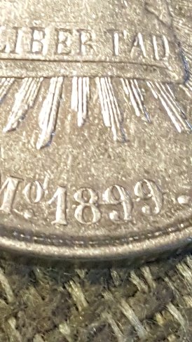 1899-Mexico-Un-Peso.-Die-Cracks-All-Over-OBV-&-Rev.-NE-Significance/-Worth?