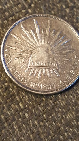 1899-Mexico-Un-Peso.-Die-Cracks-All-Over-OBV-&-Rev.-NE-Significance/-Worth?