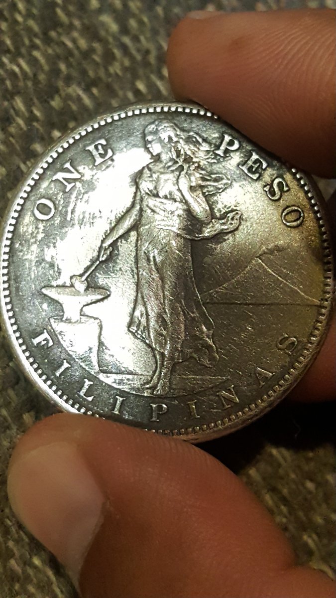 1912-S-Phillipines-One-Peso.-Looks-To-Have-Been-Cleaned.-Still-Worth?