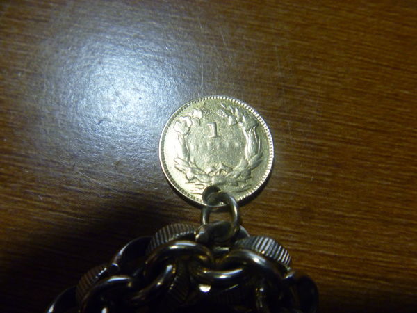 Small-Gold-Coin-As-Part-Of-A-Bracelet-|-US-Gold-Dollar