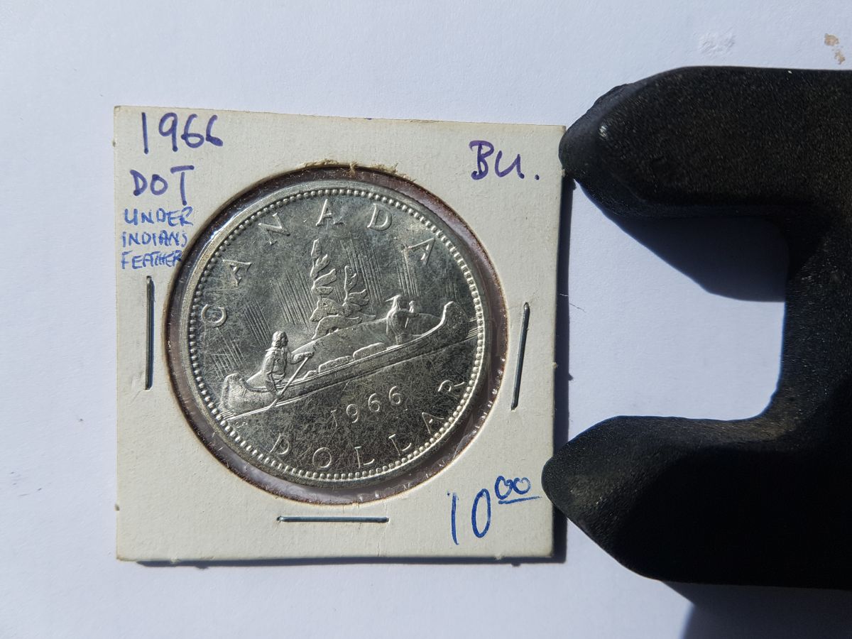 1966-Dollar-Dot-Under-Feather?