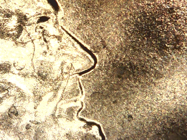 2017-P-Cent-Struck-Through-Wire-Or-String