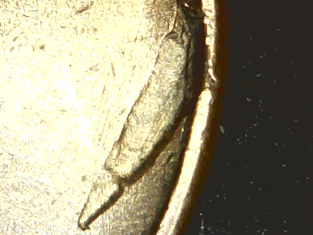 1909-S-VDB-Wheat-Cent-Delam-Or-Strike-Through